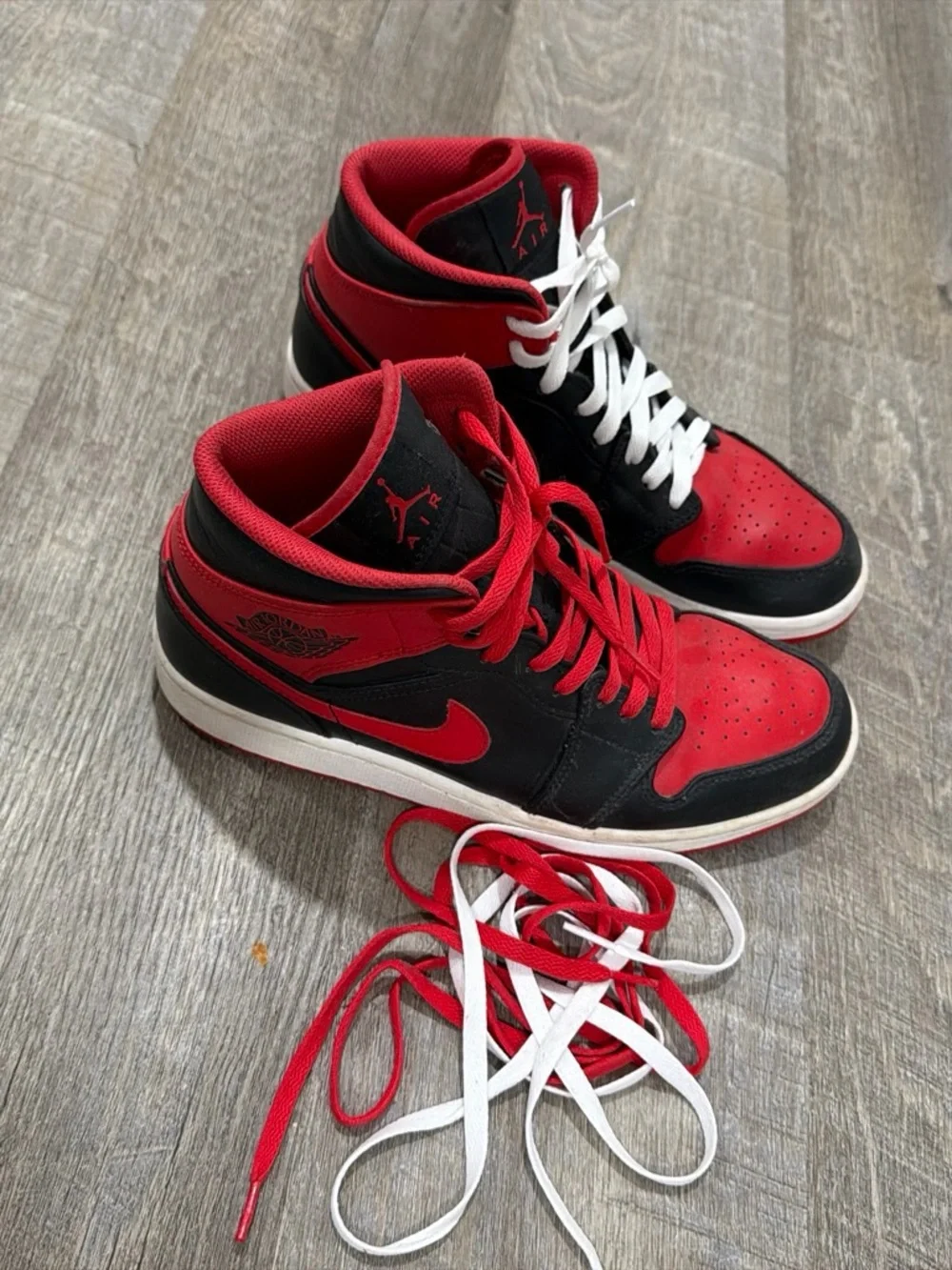 Men’s size 9 Jordan Mid-Top Sneakers in Black and Red
